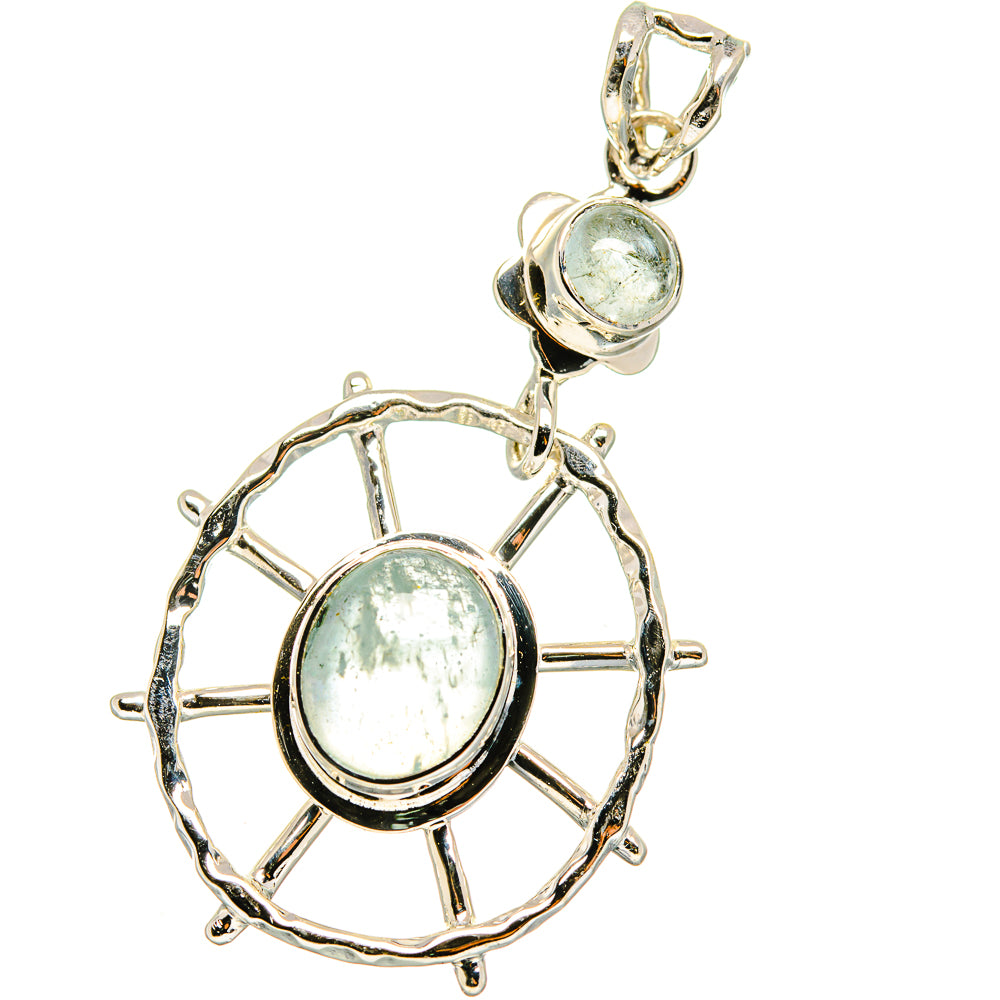 Sterling silver pendant with round aquamarine cabochon and openwork halo ring