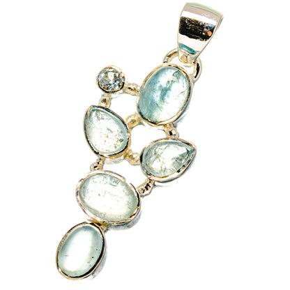 Oval gemstone pendant in sterling silver with 5 blue topaz accents, bail included