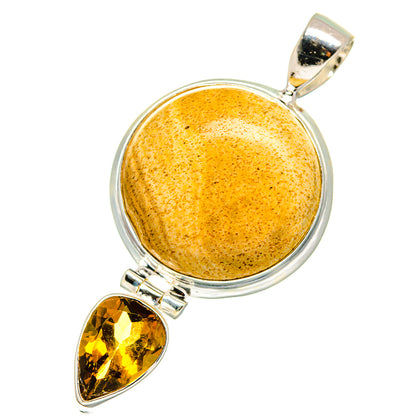 Sterling silver pendant featuring round yellow speckled stone and teardrop citrine drop