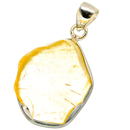 Libyan Desert Glass pendant with polished 925 silver bezel and amber yellow irregular glass