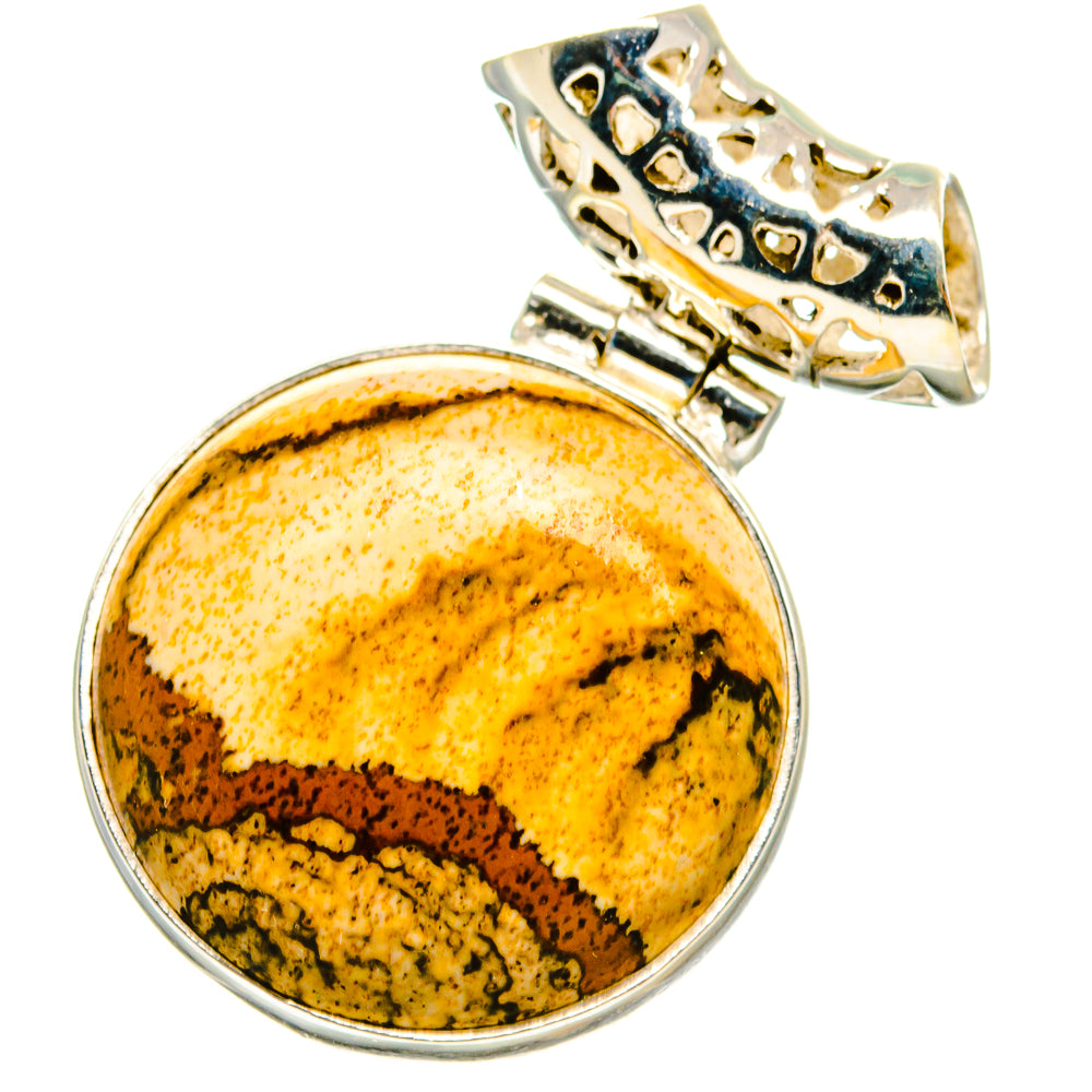 Round picture jasper pendant with silver bezel and ornate bail; stone face, yellow-brown.