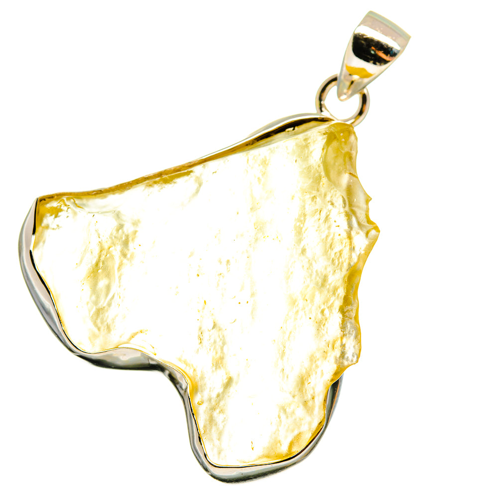 Yellow Libyan desert glass pendant with sterling silver bezel and loop bail