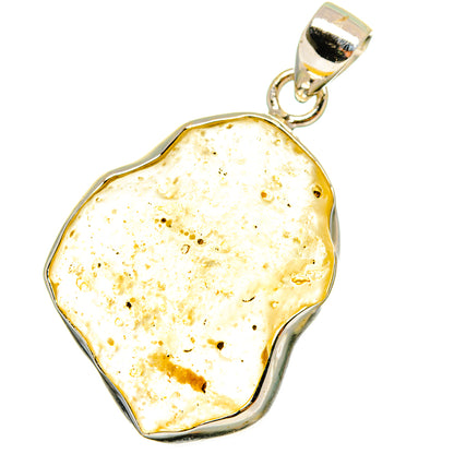 Light yellow irregular desert glass pendant with sterling silver bail and scalloped bezel
