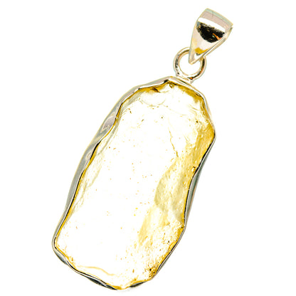 Irregular yellow Libyan Desert Glass pendant on 925 sterling silver bail
