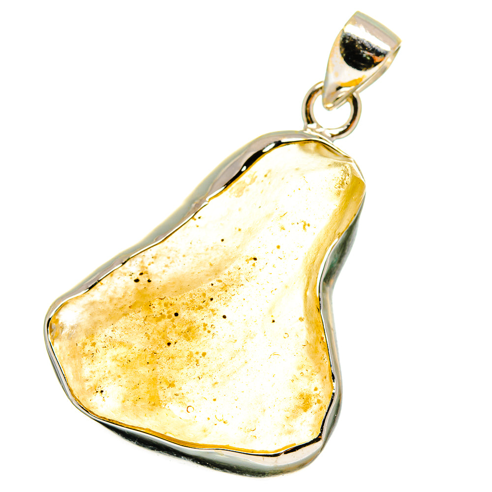 Heart-shaped desert glass pendant, pale gold speckled stone in sterling silver bezel