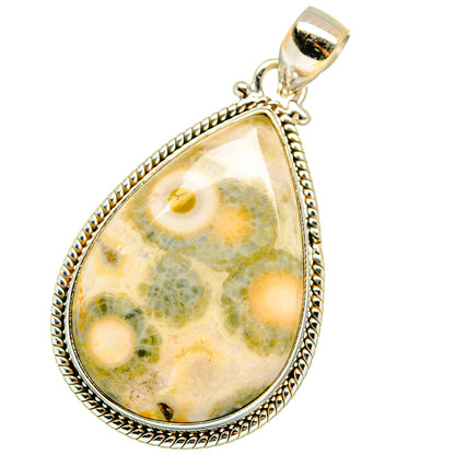 Sterling silver teardrop pendant with ocean jasper stone, silver border and loop
