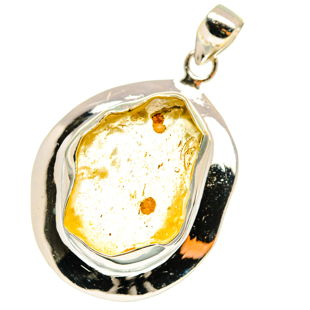 Sterling silver pendant with teardrop amber glass inlay and top loop bail.
