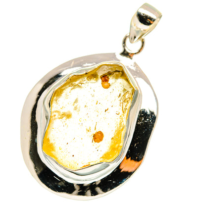 Sterling silver pendant with teardrop amber glass inlay and top loop bail.