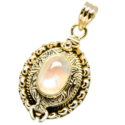Sterling silver moonstone pendant with oval iridescent gem and ornate bezel, loop bail