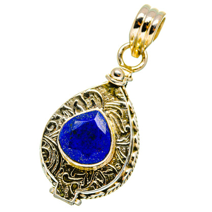 Sterling silver lapis lazuli pendant, teardrop ornate frame with blue cabochon and loop