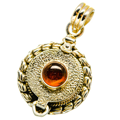 Round amber cabochon silver pendant with engraved border and top loop bail