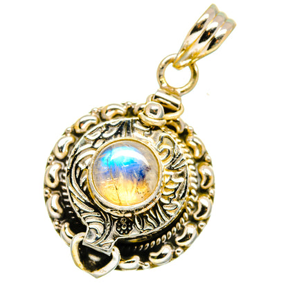 Round ornate silver pendant with prong-set rainbow moonstone cabochon and bail