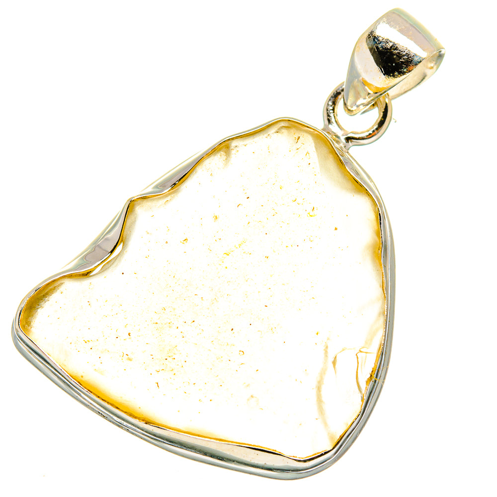 Heart-shaped pale yellow glass pendant in sterling silver bezel with bail cap