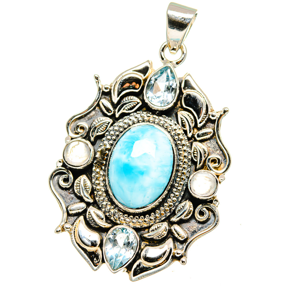 Sterling silver oval larimar pendant with blue gemstone accents and ornate frame