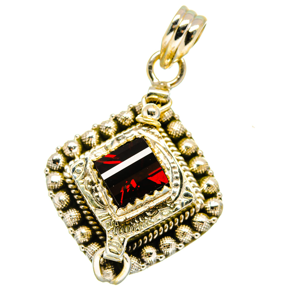925 sterling silver pendant with red gemstone and ornate filigree bezel