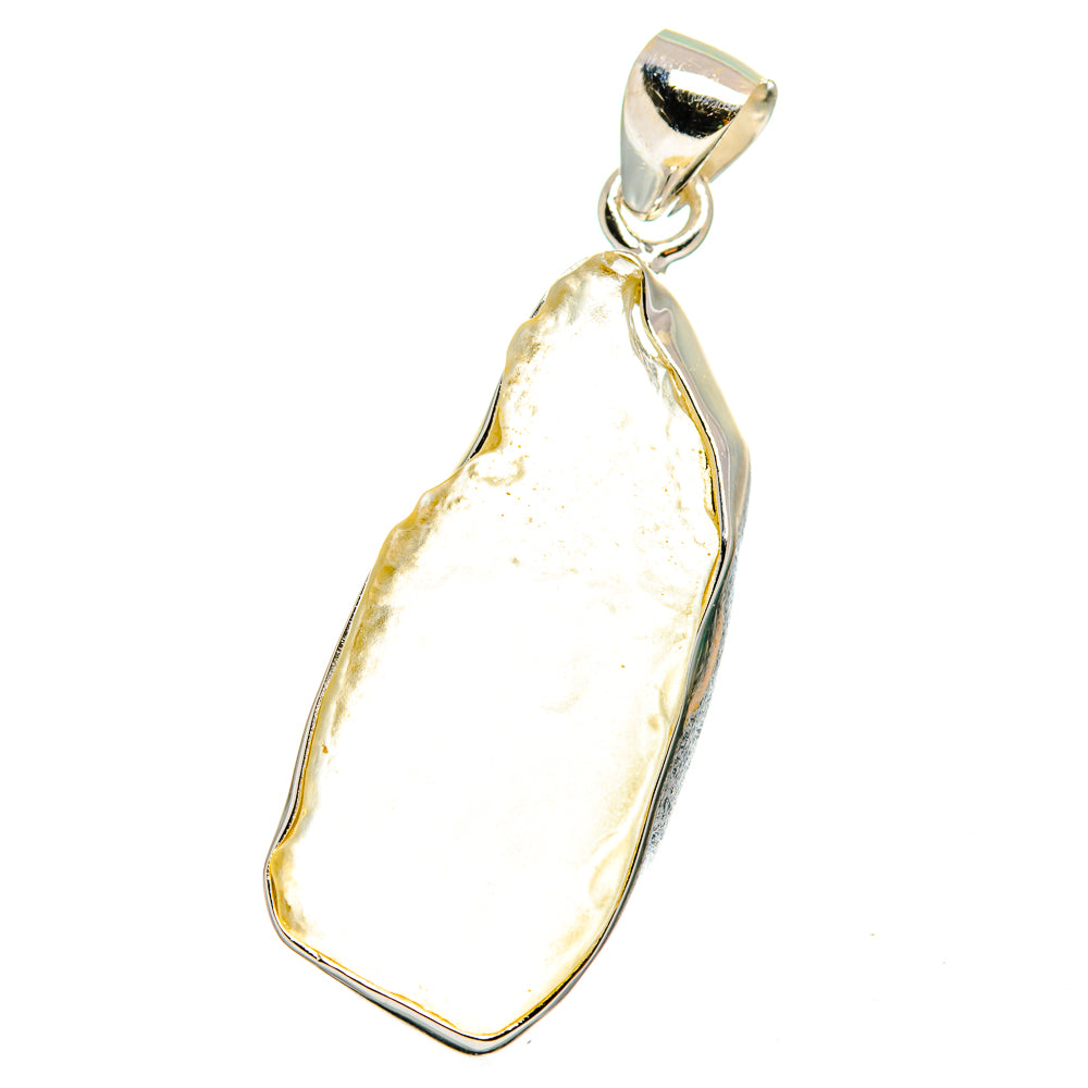 Sterling silver pendant with irregular pale yellow desert glass cabochon