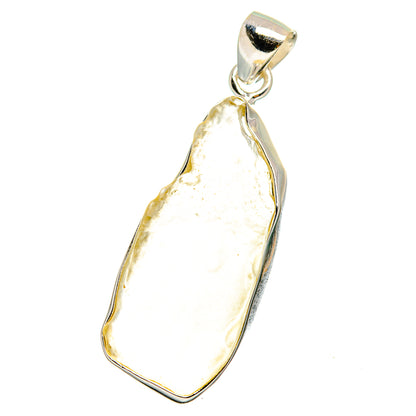 Sterling silver pendant with irregular pale yellow desert glass cabochon