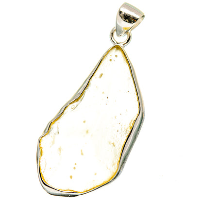 Sterling silver teardrop pendant with pale yellow Libyan Desert Glass cabochon