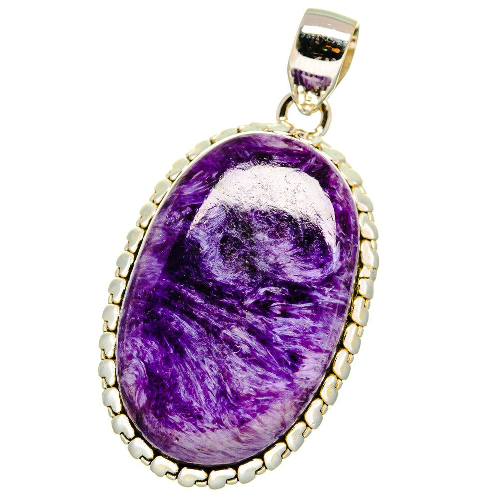 Purple charoite pendant, oval stone in silver beaded bezel with loop bail.