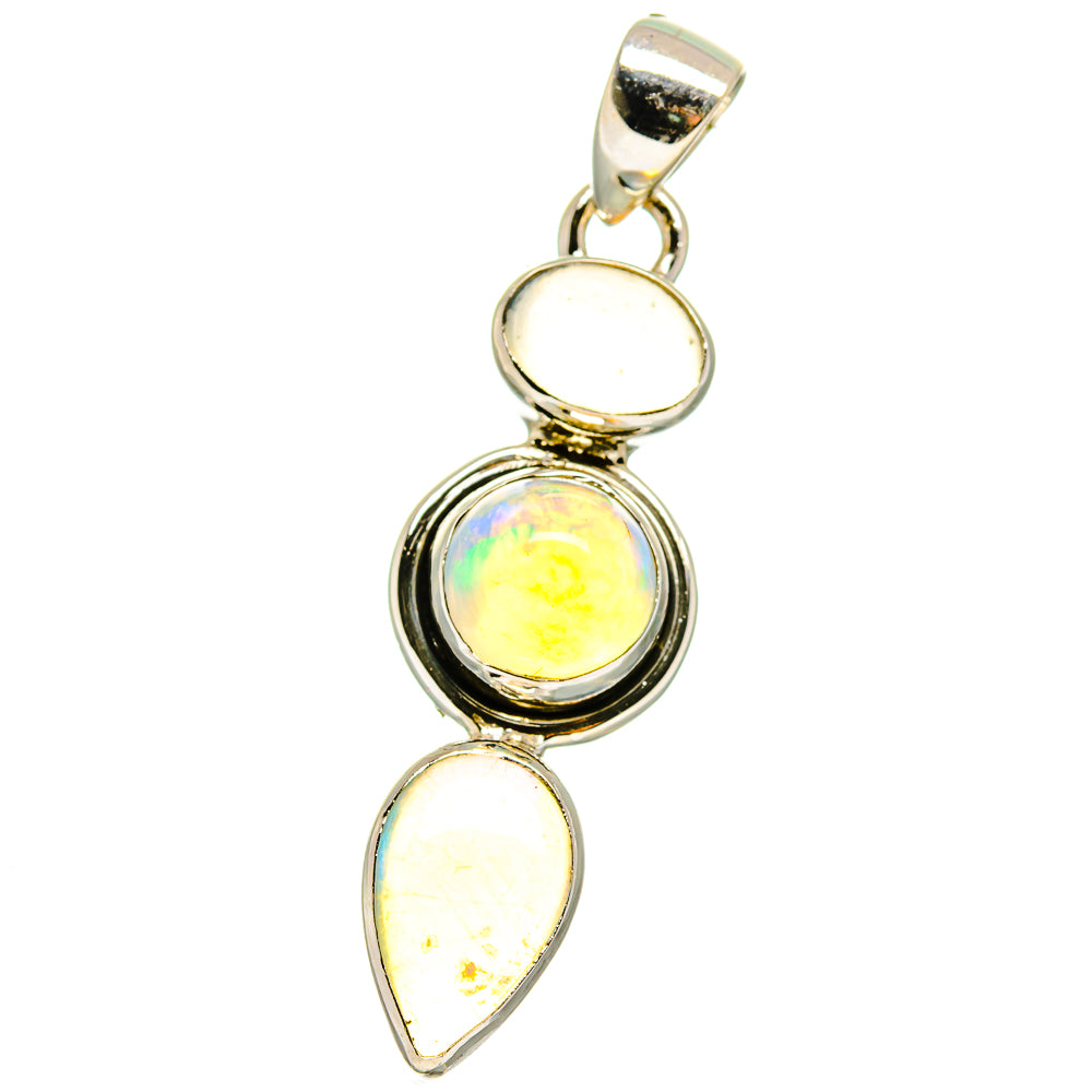 925 sterling silver Ethiopian opal pendant with round bezel and teardrop opals, iridescent.