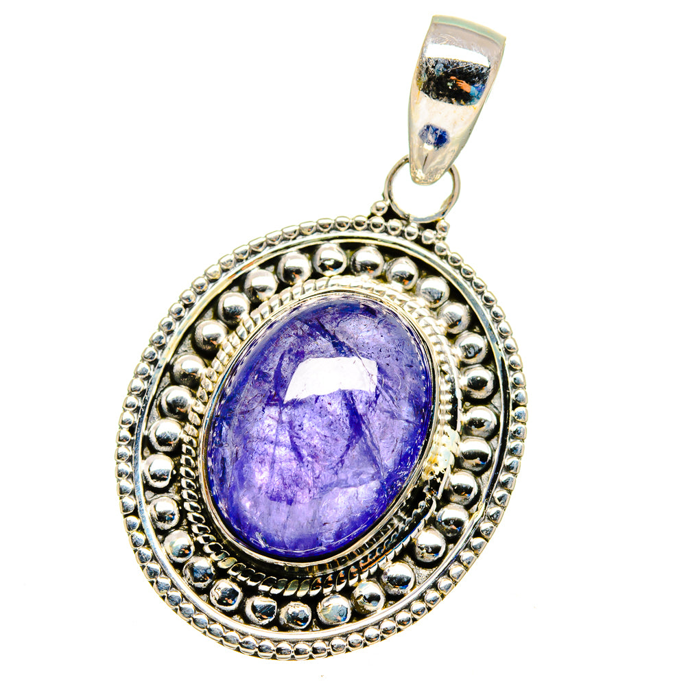 Oval tanzanite pendant in ornate 925 sterling silver setting, large purple stone.