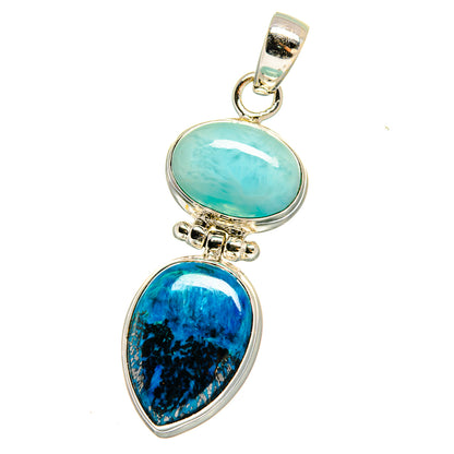 Two-stone oval gemstone pendant in sterling silver with light blue and deep blue cabochons