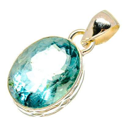 Oval blue-green fluorite pendant with faceted center stone and silver bail loop