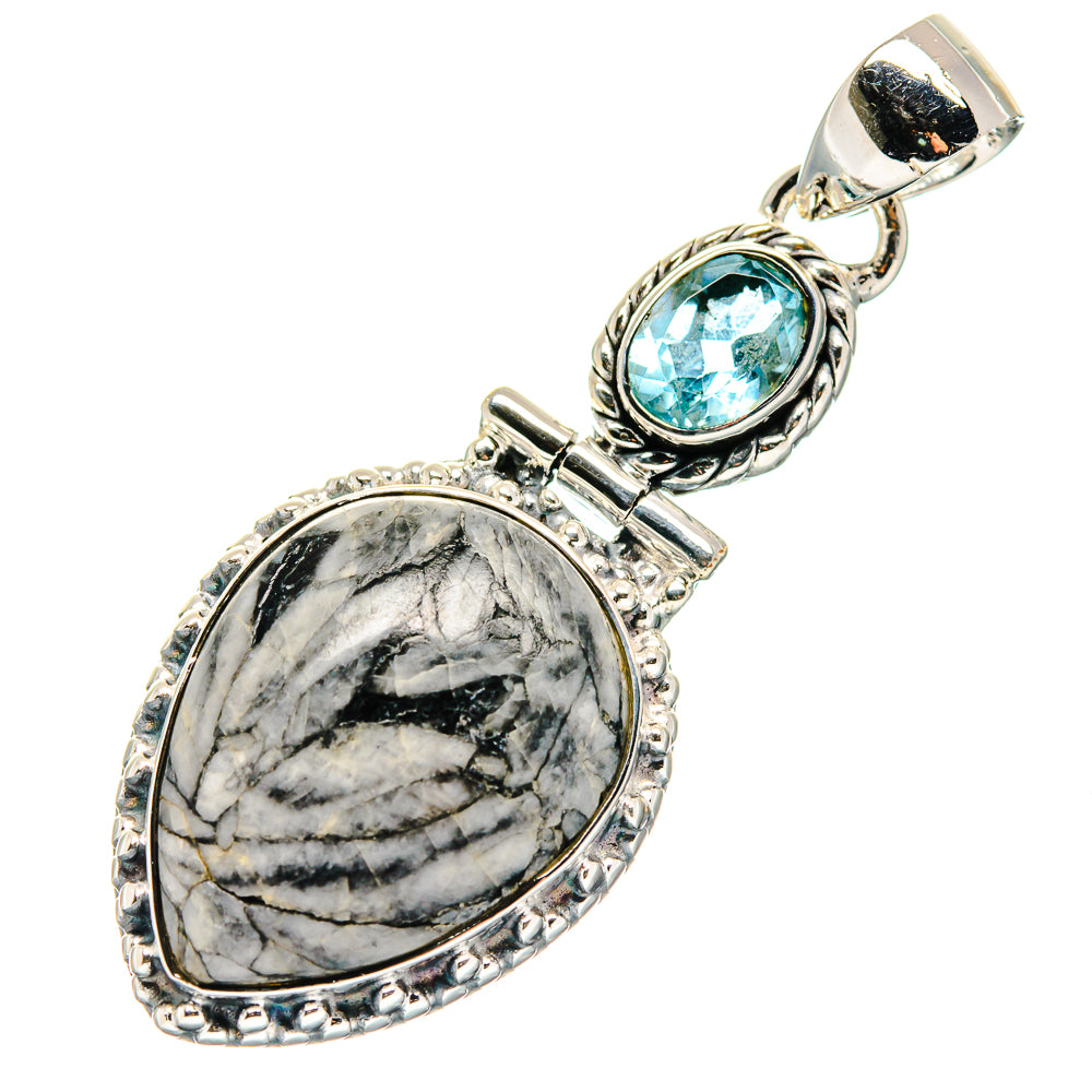 Oval gray pinolith jasper pendant with blue topaz teardrop frame, sterling silver bail