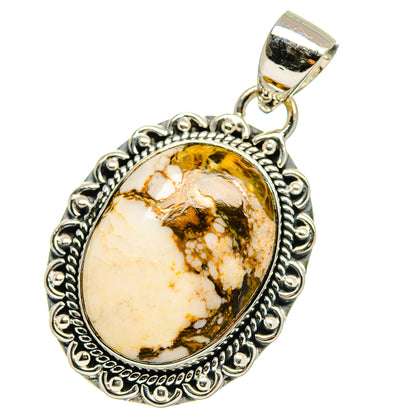 Oval tan-and-brown jasper pendant in sterling silver with decorative frame and hanging bail.