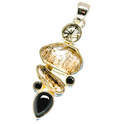Sterling silver pendant with rutilated quartz, black onyx ovals, and tourmalinated round stone