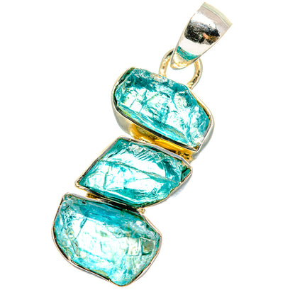 Rough apatite pendant with teal stone rectangles in silver bezel and loop top