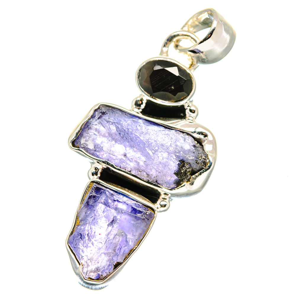 Sterling silver pendant with rough purple tanzanite stones and black onyx bezel