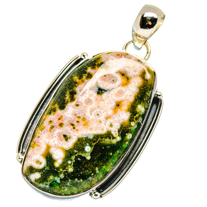 Oval ocean jasper pendant on sterling silver bail, yellow flecks on green-black stone