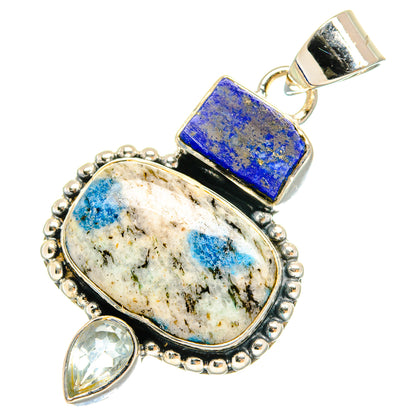 Sterling silver pendant bail with oval white quartz, blue lapis rectangle, and pear-shaped drops