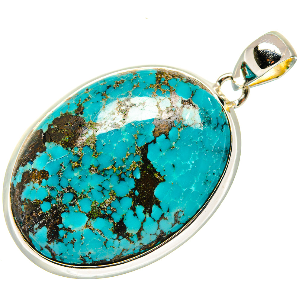 Oval turquoise stone pendant in 925 sterling silver bezel with hinged bail