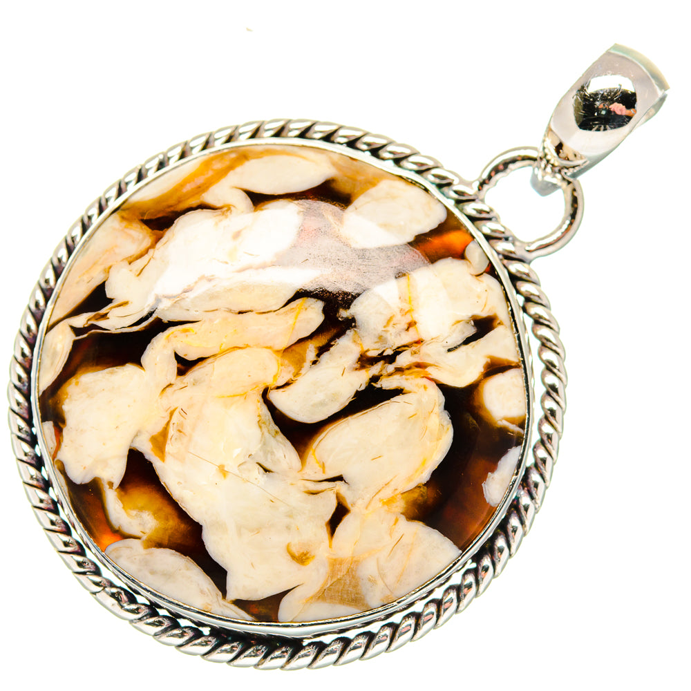Sterling silver round pendant with rope border and marbled peanut wood jasper center