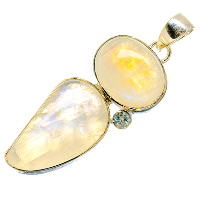 Sterling silver moonstone pendant with two teardrop cabochons and blue gem