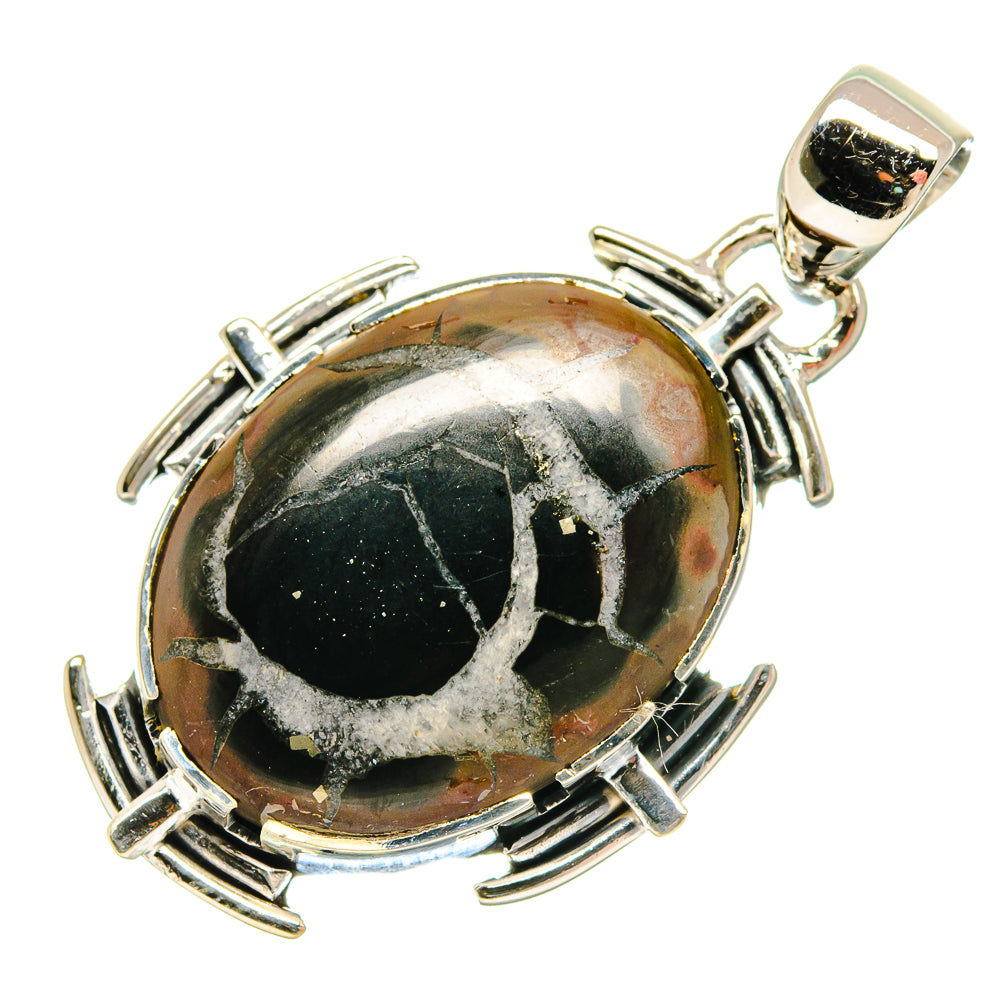 Round silver septarian geode pendant with black stone in segmented bezel