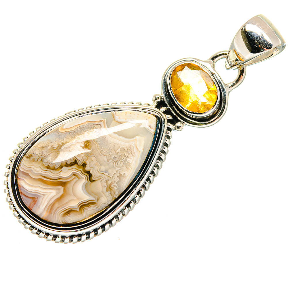 Teardrop agate framed pendant with round yellow citrine stone on sterling silver bail