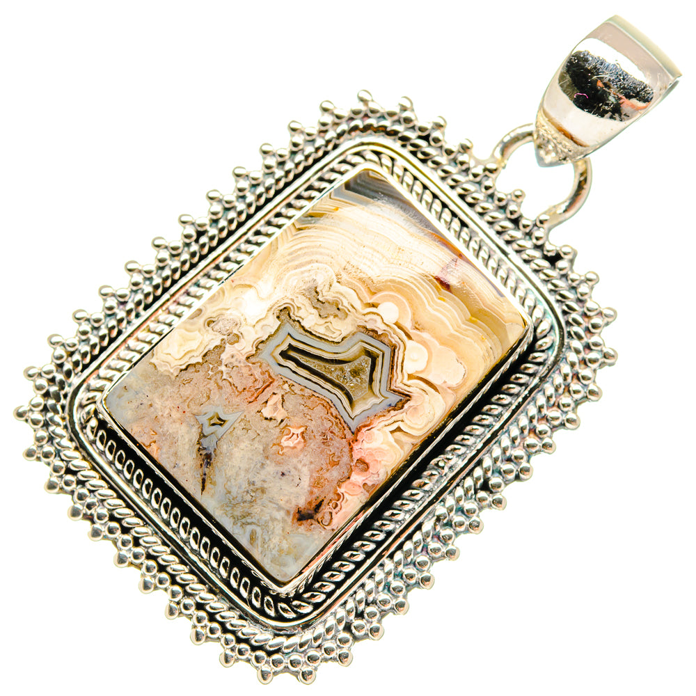 Sterling silver lace agate rectangular pendant with ornate bezel and textured frame