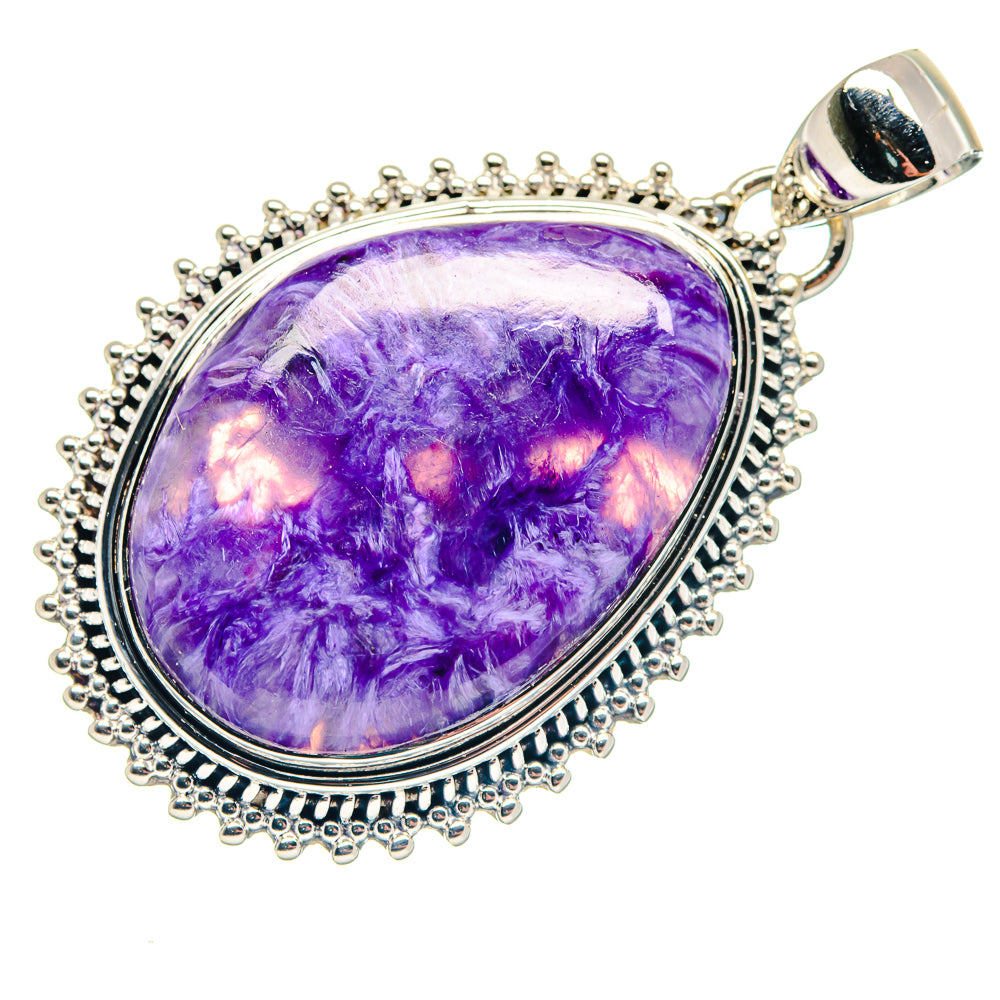 Oval charoite pendant with purple gemstone set in sterling silver with beaded border