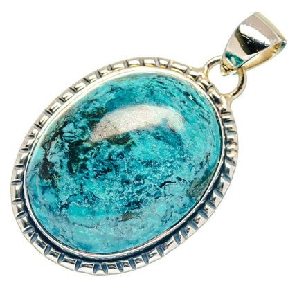 Oval turquoise pendant with etched silver bezel and silver bail, front view