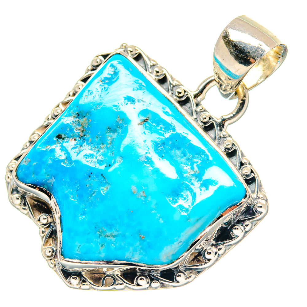 Chrysocolla pendant in sterling silver with bright blue stone and top bail detail