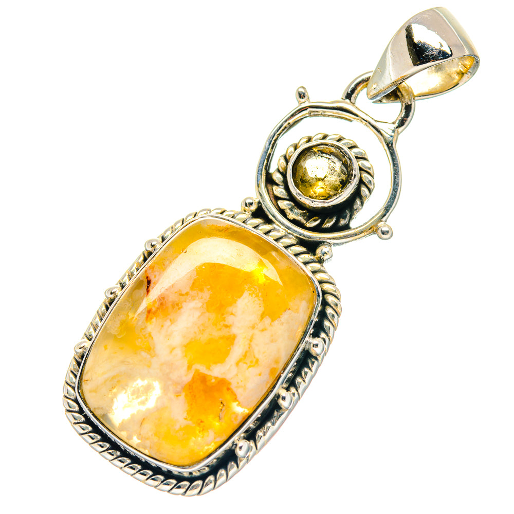 Oval citrine cabochon pendant with ornate silver bezel and bail, yellow-gold gemstone