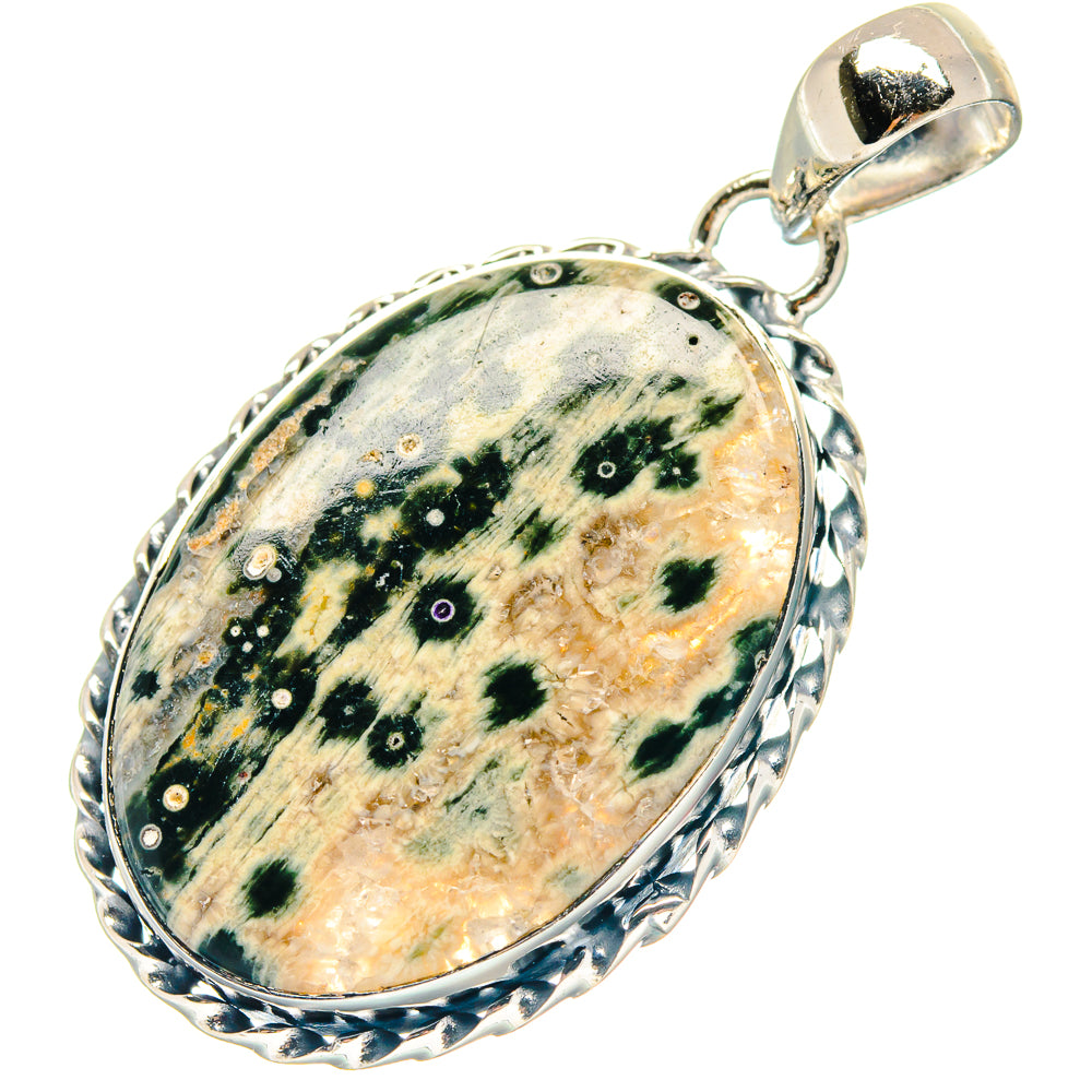 Oval ocean jasper pendant with 925 sterling silver bail and bezel, speckled green pattern.