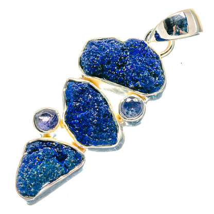 Sterling silver lapis lazuli pendant with three rough blue stones and small round accents