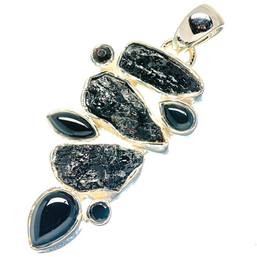 Rough black stone pendant with polished 925 silver setting and oval onyx accents
