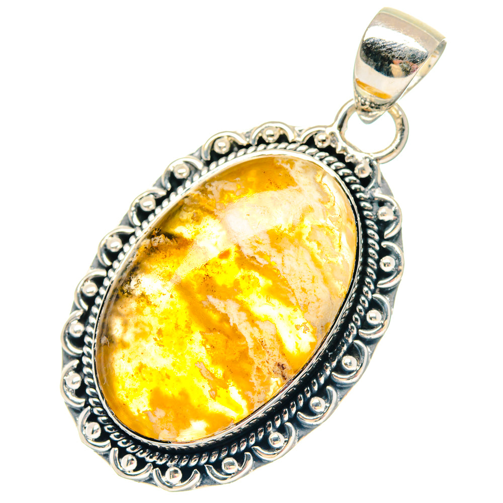 Sterling silver oval agate pendant with teardrop bail, ornate edge, and yellow-orange stone