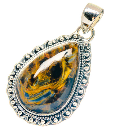 Oval pietersite cabochon pendant in scalloped sterling silver frame with bail