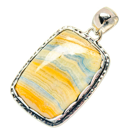 Sterling silver pendant with blue scheelite stone, rounded rectangular frame and loop bail
